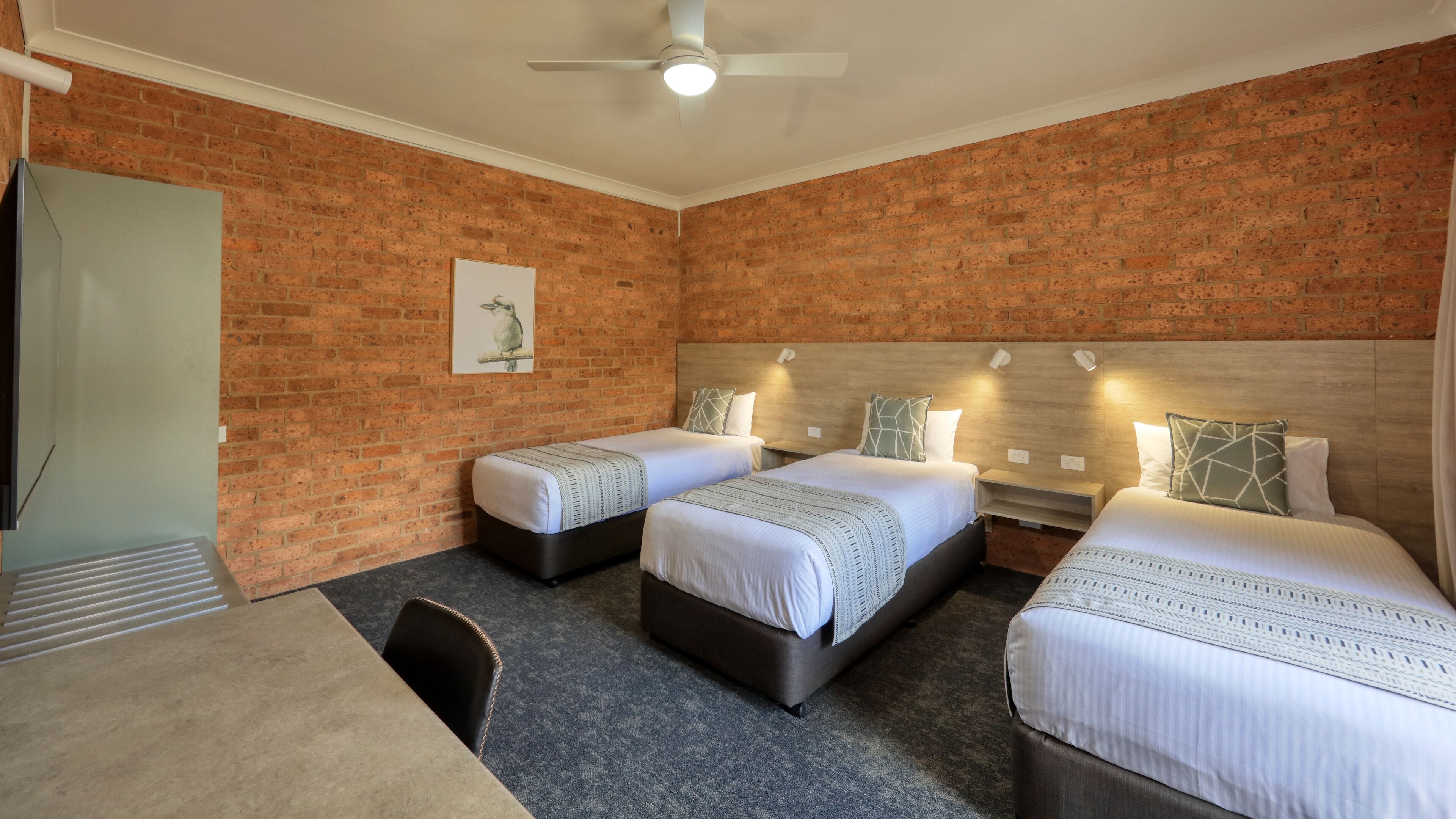 Family Room, Non Smoking, Kitchenette (2Bd Family) | Pillow-top beds, individually furnished, laptop workspace