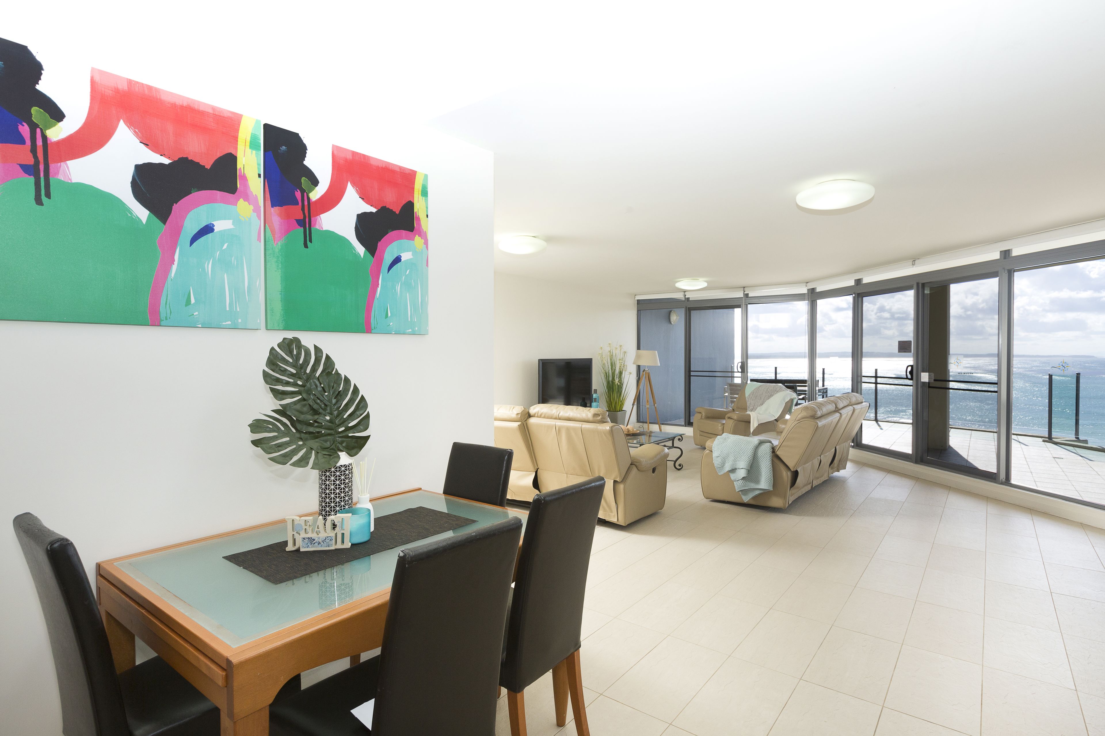 Penthouse | Living room | 55-inch TV with satellite channels