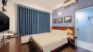 Superior Double Room | Minibar, in-room safe, blackout curtains, iron/ironing board