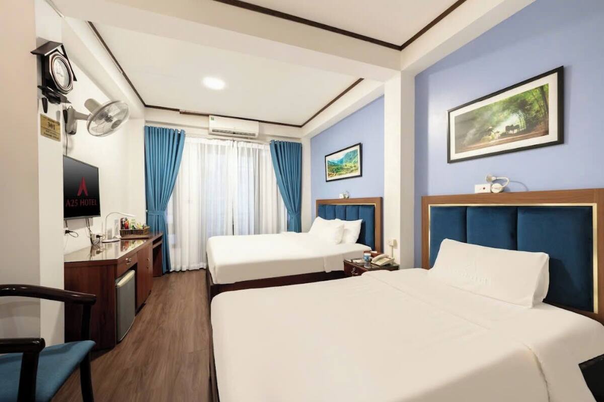Deluxe Family Room | Minibar, két bảo mật tại phòng, màn/rèm cản sáng 