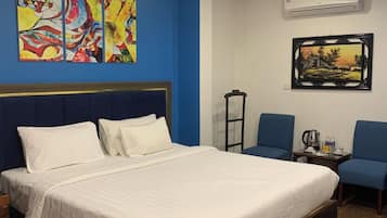 Superior Double Room | Minibar, in-room safe, blackout drapes, iron/ironing board