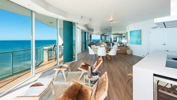 Platinum Sub-Penthouse, 3 bedrooms, Balcony, Oceanfront | Living area | 55-inch Smart TV with satellite channels, TV, pay films