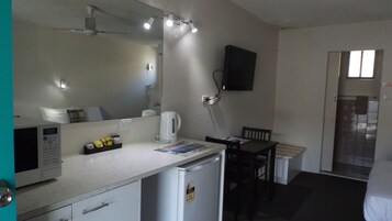 Mini-fridge, microwave, electric kettle, toaster