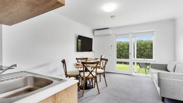 Apartment, 2 Bedrooms | Living area | TV