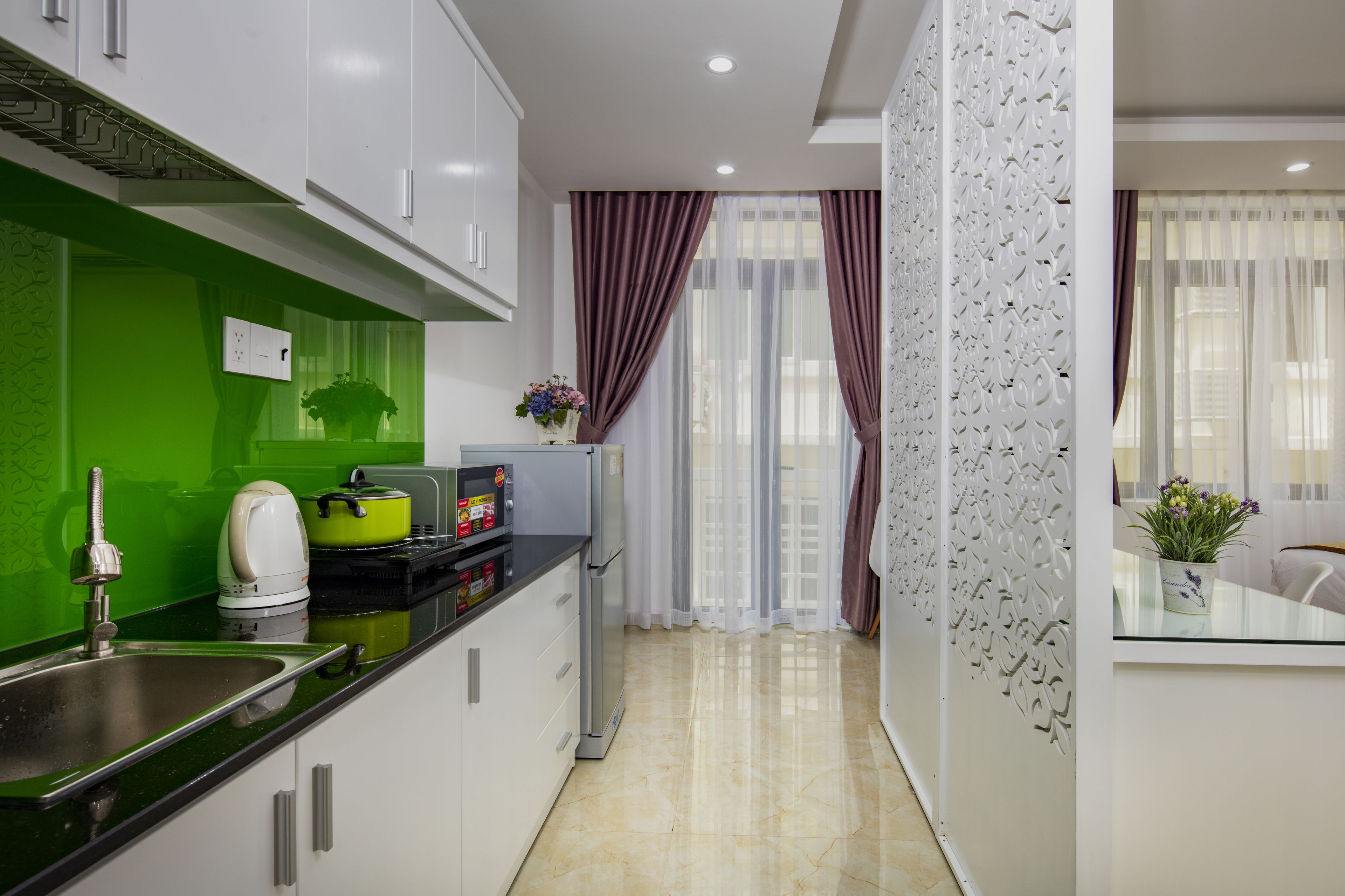 Habitación Deluxe doble | Cocina privada | Frigorífico, microondas (previa solicitud), placa de cocina y arrocera