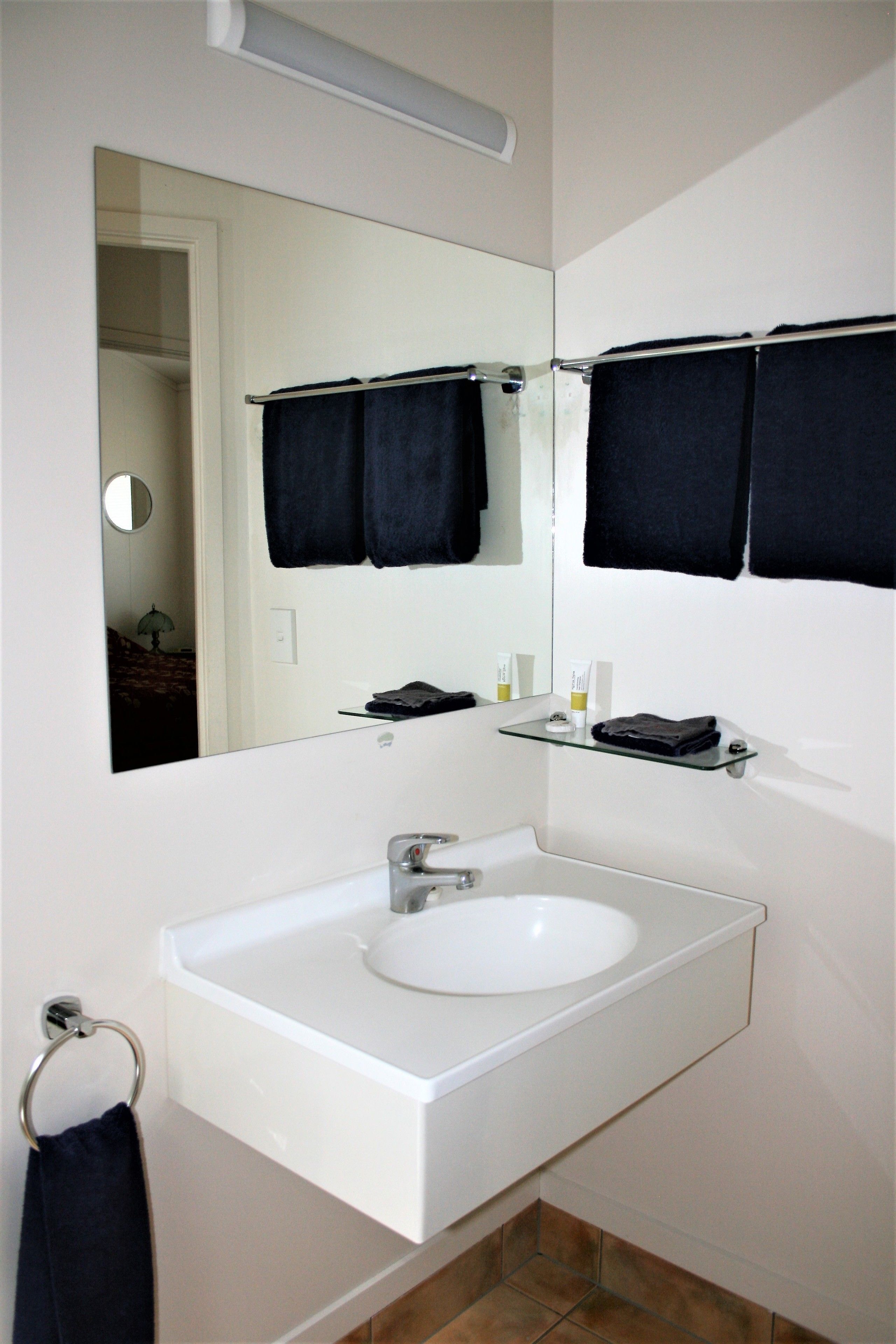 two bedroom | bathroom | hair dryer, soap, shampoo, toilet paper