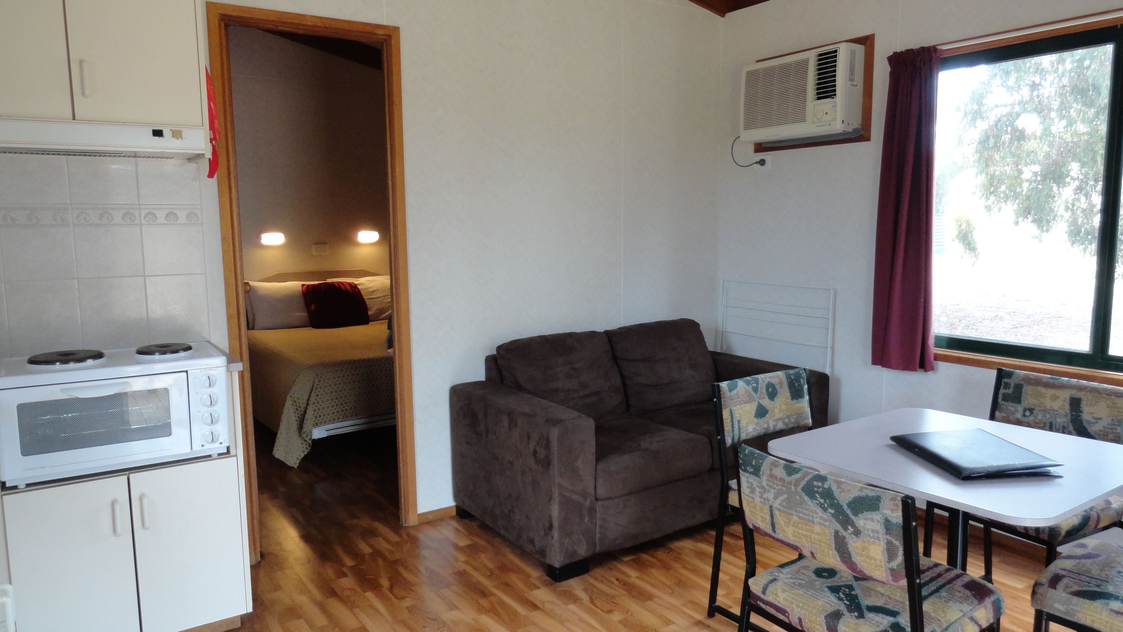 Standard Suite, 1 Bedroom, Non Smoking, Kitchen (cabin) | Individually furnished, desk, laptop workspace, iron/ironing board