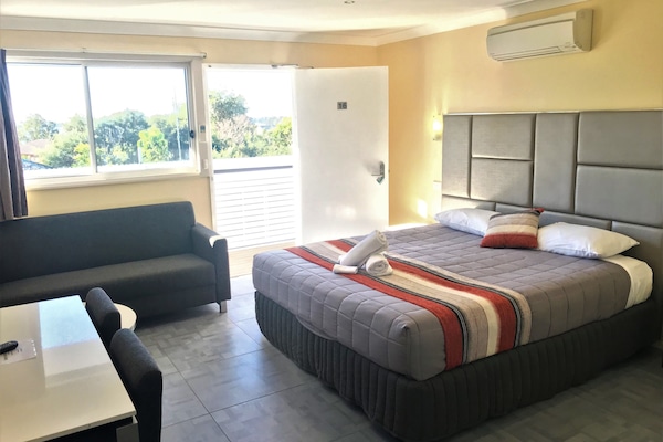 Superior Room, 1 King Bed | Blackout drapes, iron/ironing board, free WiFi, bed sheets