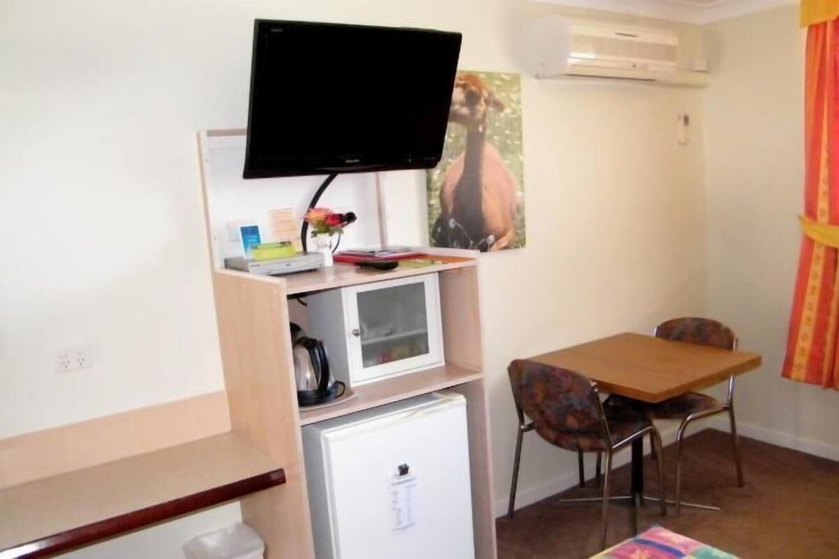 Iron/ironing board, cribs (free), WiFi (free), bed sheets