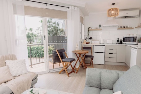 Deluxe Apartment, 1 Queen Bed, Balcony, River View | Private kitchen | Full-size fridge, microwave, stovetop, coffee/tea maker