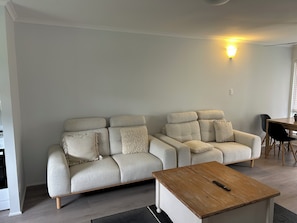 Villa | Living area | Flat-screen TV, DVD player - River Sands Apartments (Maroochydore)