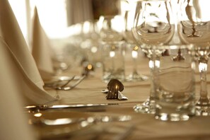 A table set with clear glassware and silverware, indicating a formal dining arrangement. - Barwon Heads Golf Club (Barwon Heads)