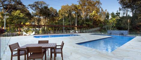 2 outdoor pools, pool umbrellas, pool loungers