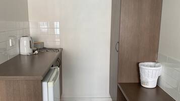 Standard Double or Twin Room | Private kitchen | Mini-fridge, coffee/tea maker, electric kettle, cookware/dishes/utensils