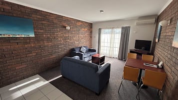 Chambre Deluxe, non-fumeur, coin cuisine | Coin séjour