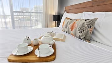 Deluxe Apartment, 1 Bedroom, Partial Ocean View | Minibar, blackout drapes, iron/ironing board, free WiFi