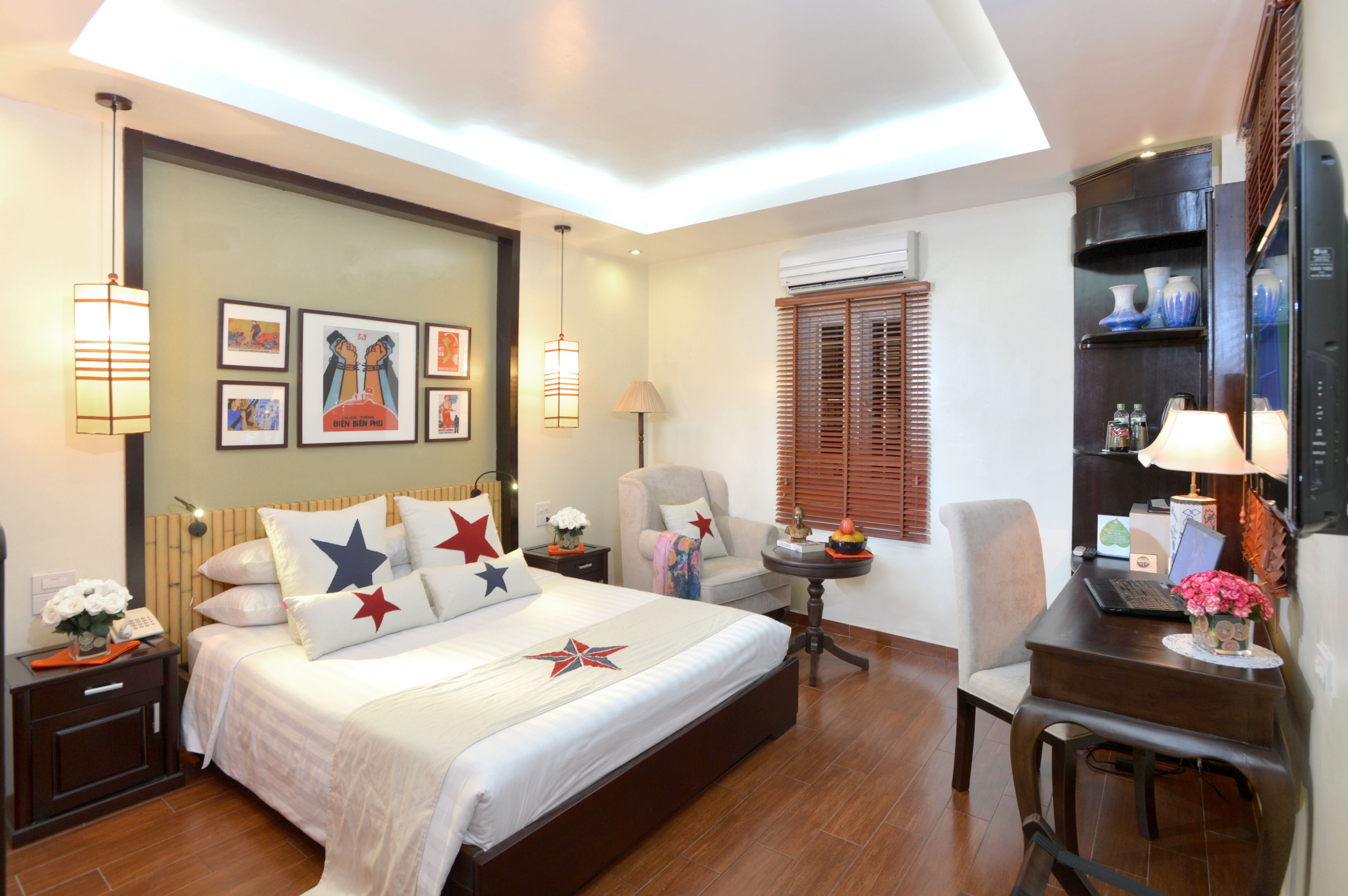 deluxe double room | minibar, in-room safe, individually decorated, blackout curtains