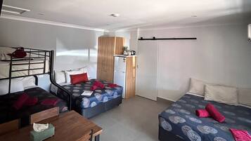 Family Room | Pillow-top beds, free WiFi, bed sheets