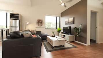 Casa de campo de lujo, 1 habitación | Zona de estar | Una televisión LCD