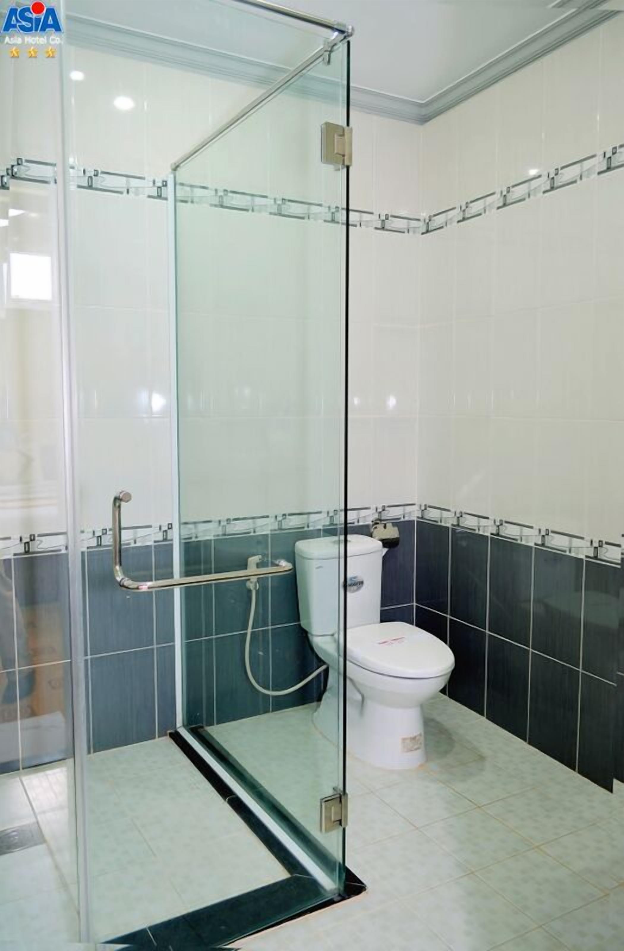 Shower, free toiletries, hair dryer, slippers