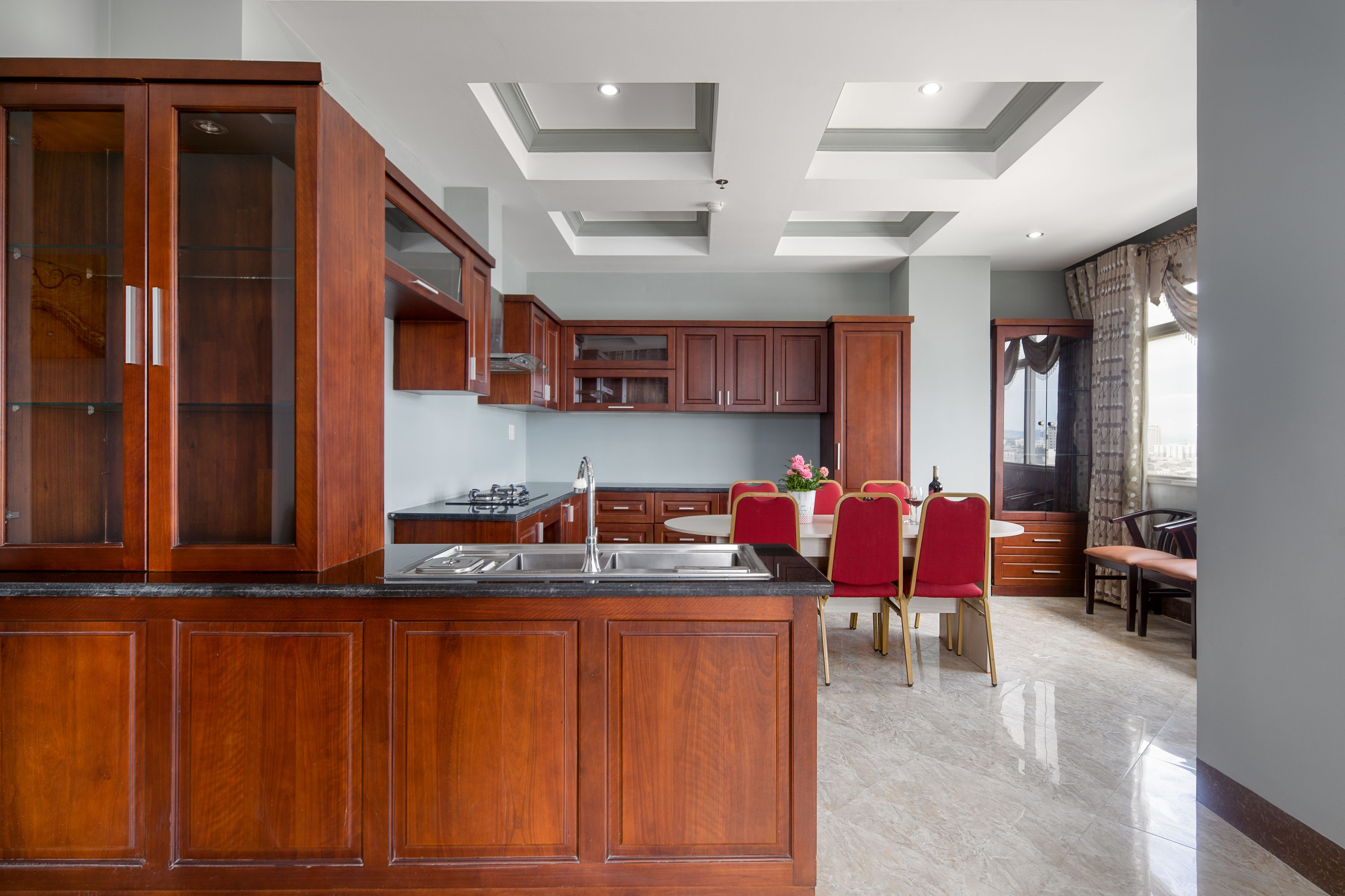 electric kettle, cleaning supplies, paper towels