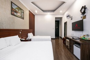 Quarto família | Frigobar, cofres nos quartos, cortinas blackout