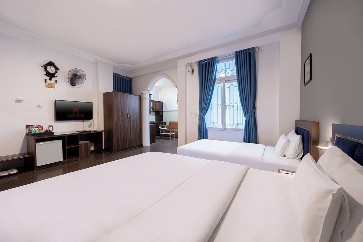 Family Room | Minibar, in-room safe, blackout drapes, iron/ironing board