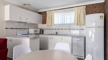 Appartamento Deluxe, 1 camera da letto, cucina (Apartment) | Cucina privata | Frigorifero, microonde, macchina per tè/caffè, bollitore elettrico