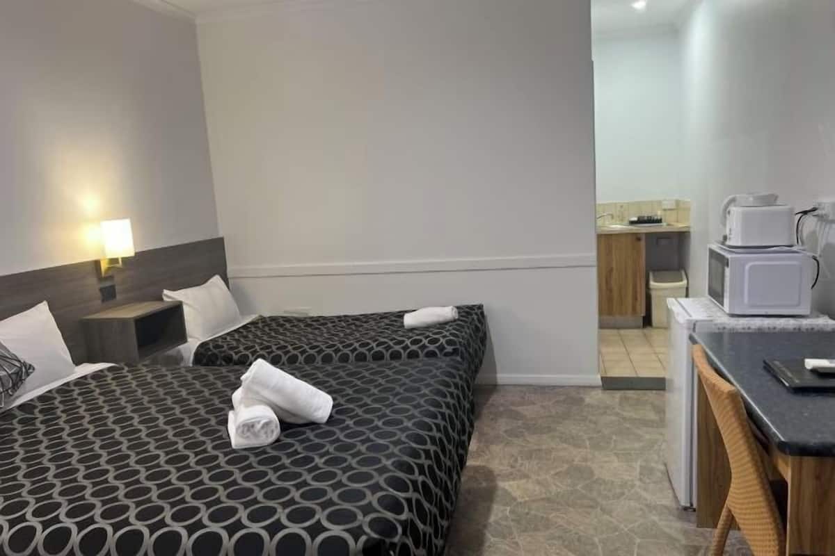 Premium bedding, down comforters, Select Comfort beds, in-room safe