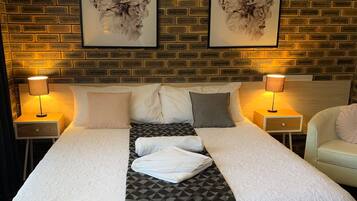 King Room | Individually decorated, individually furnished, desk, blackout drapes
