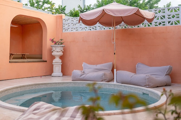 Outdoor pool, free cabanas, pool umbrellas