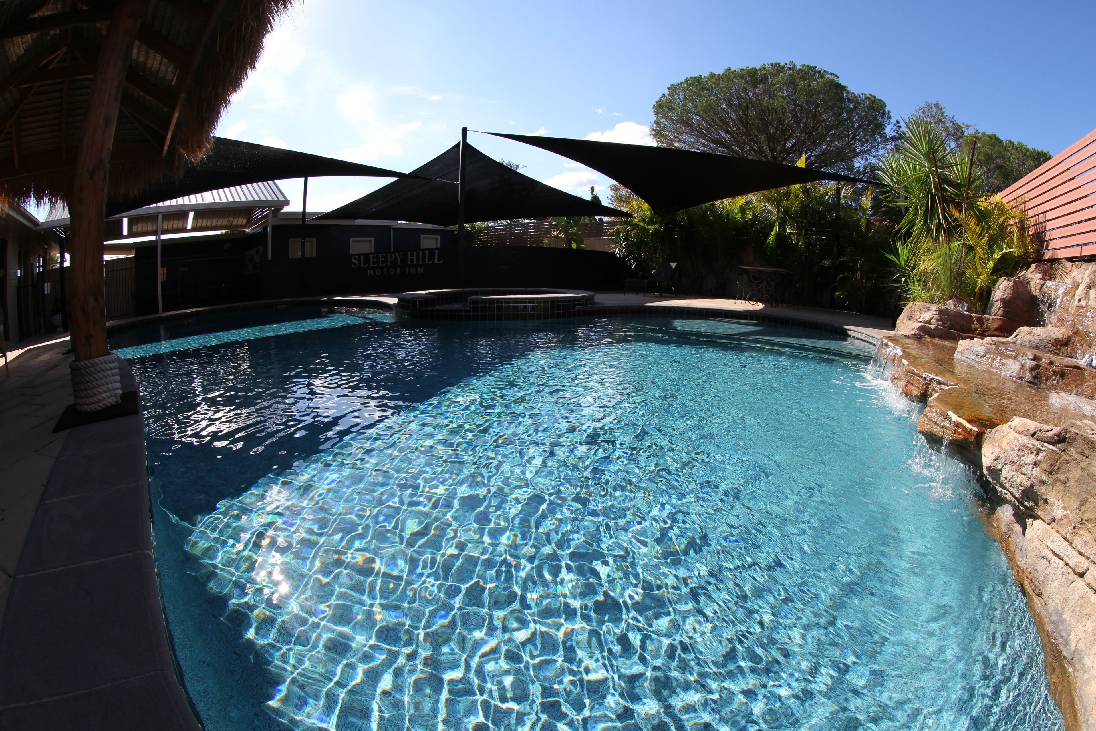 Seasonal outdoor pool, pool loungers