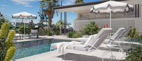 Piscine extérieure, chaises longues