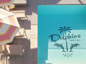 Outdoor pool, open 6:00 AM to 10:00 PM, pool umbrellas, sun loungers - Dolphins Motel (Mollymook)