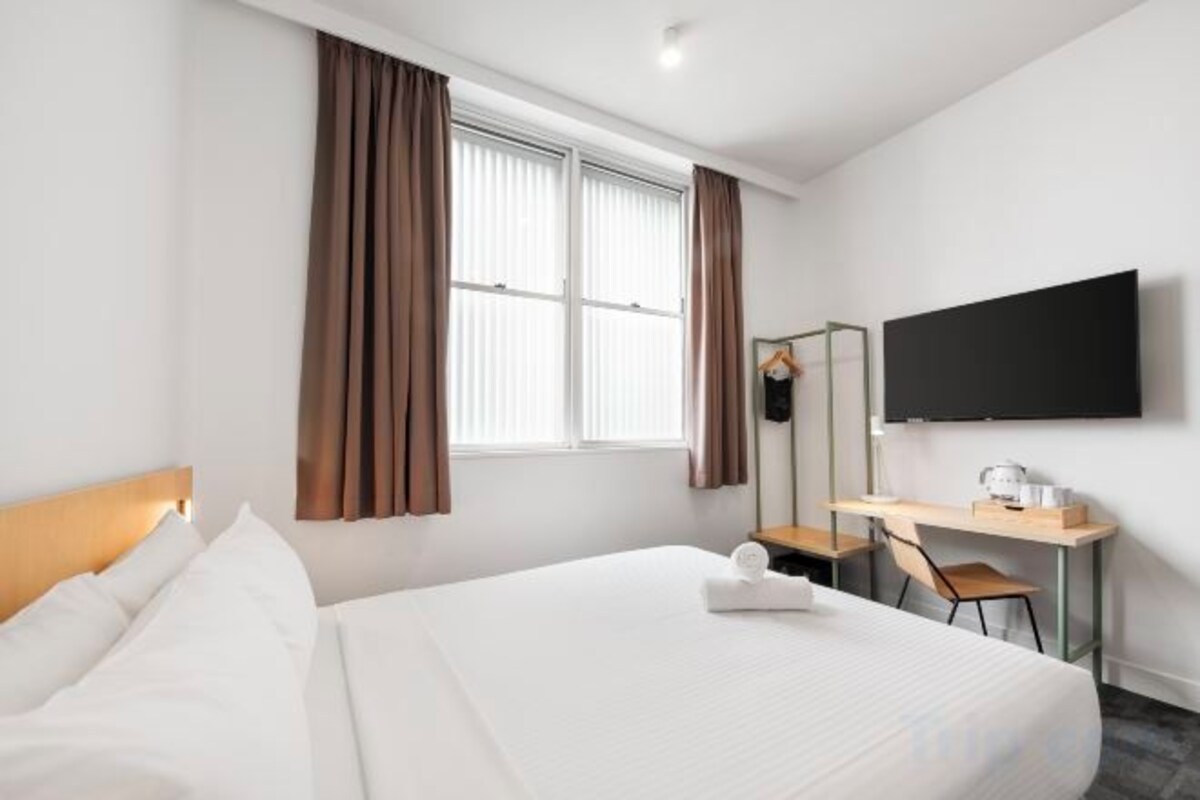 Blackout drapes, WiFi (free), bed sheets