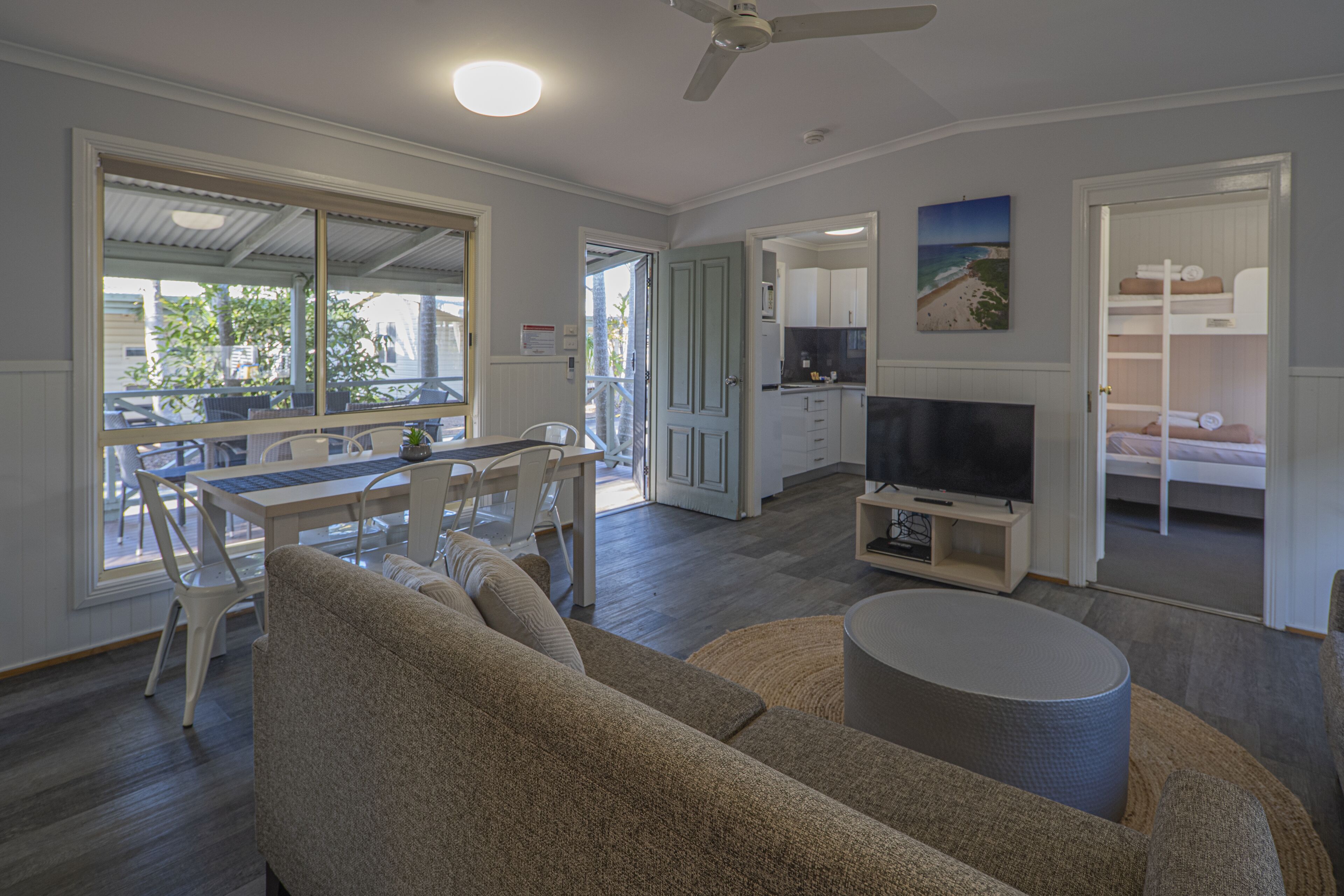 Deluxe Cabin (2BR) | Living area | TV