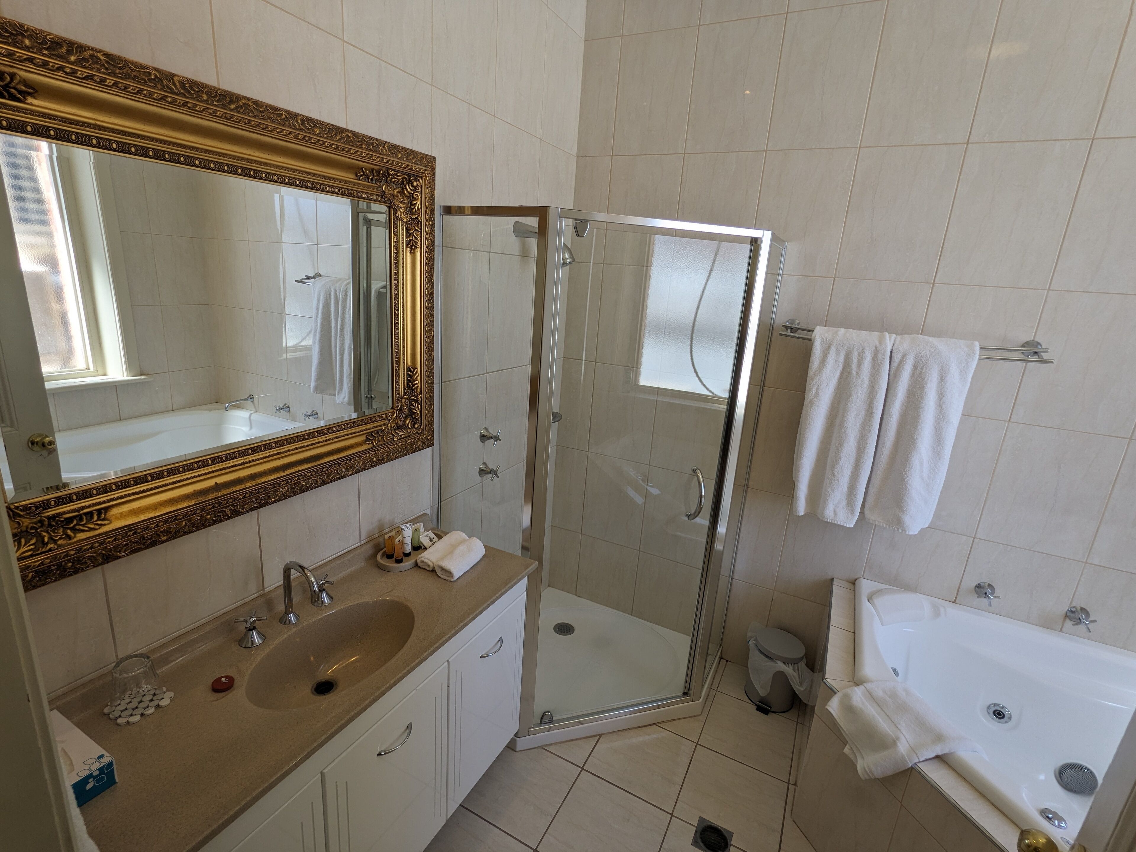 executive suite | bathroom | separate bathtub and shower, jetted bath, hair dryer, towels