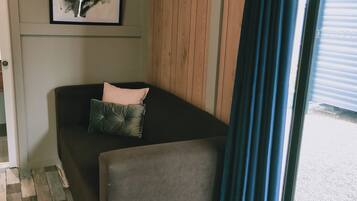 Standard Studio | Living area | 32-inch LED TV with cable channels, TV, DVD player