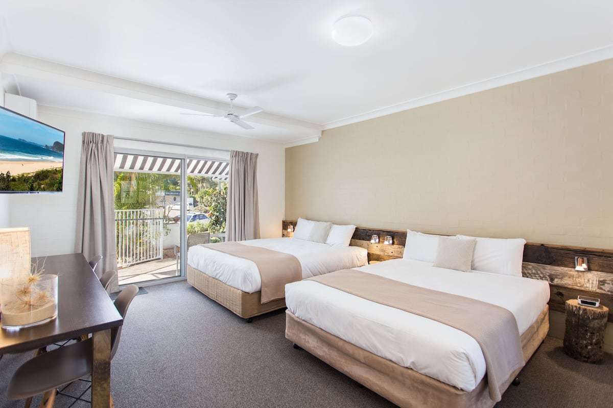 Desk, blackout curtains, iron/ironing board, bed sheets