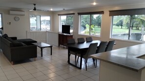 Family Apartment, 3 Bedrooms, Golf View | Living area | LED TV