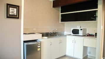 Fridge, microwave, stovetop, coffee/tea maker