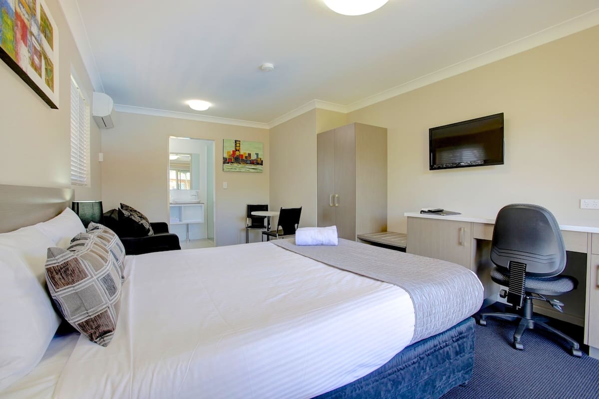Desk, blackout curtains, soundproofing, iron/ironing board