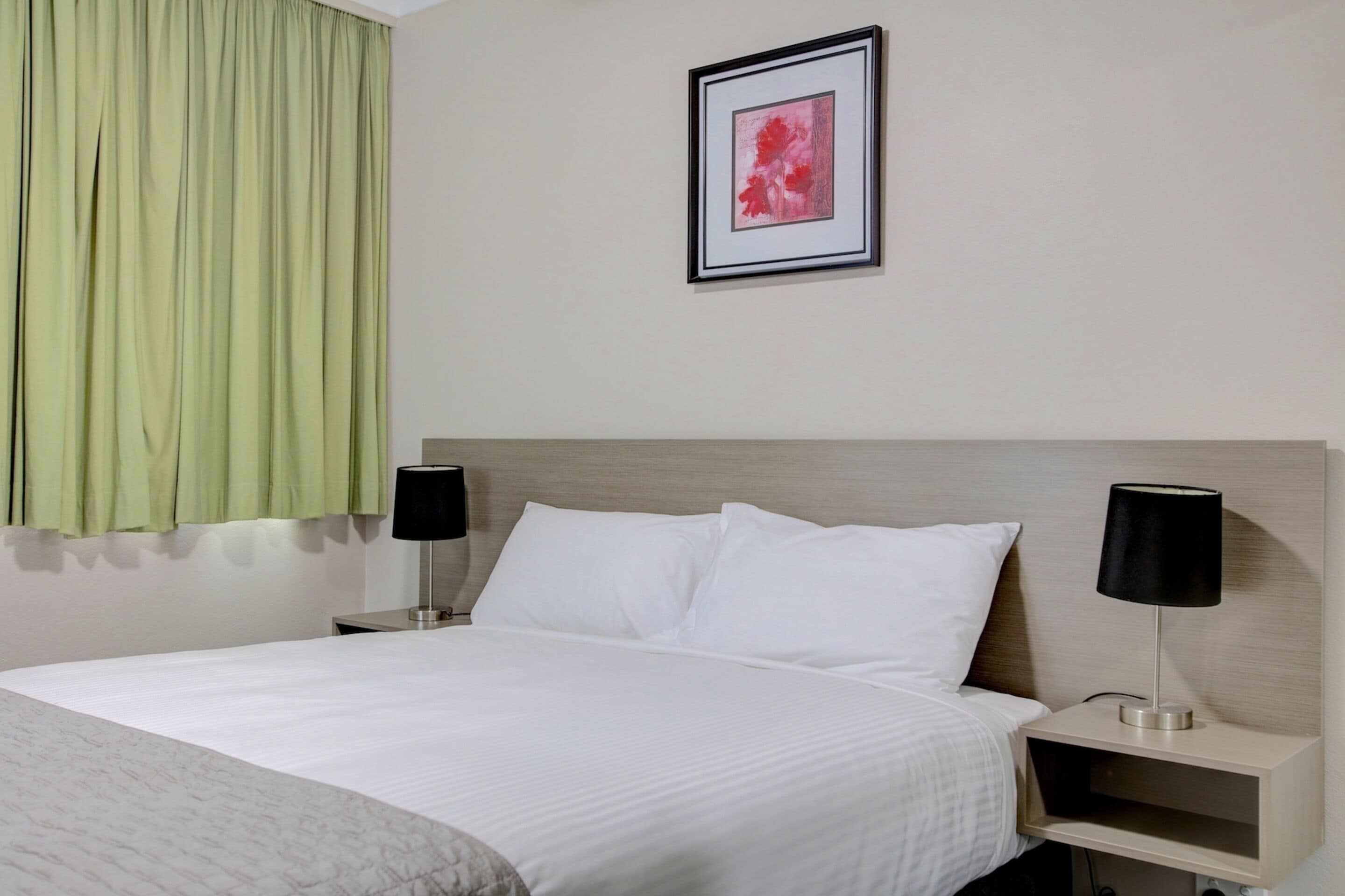 one bedroom apartment | desk, blackout curtains, soundproofing, iron/ironing board