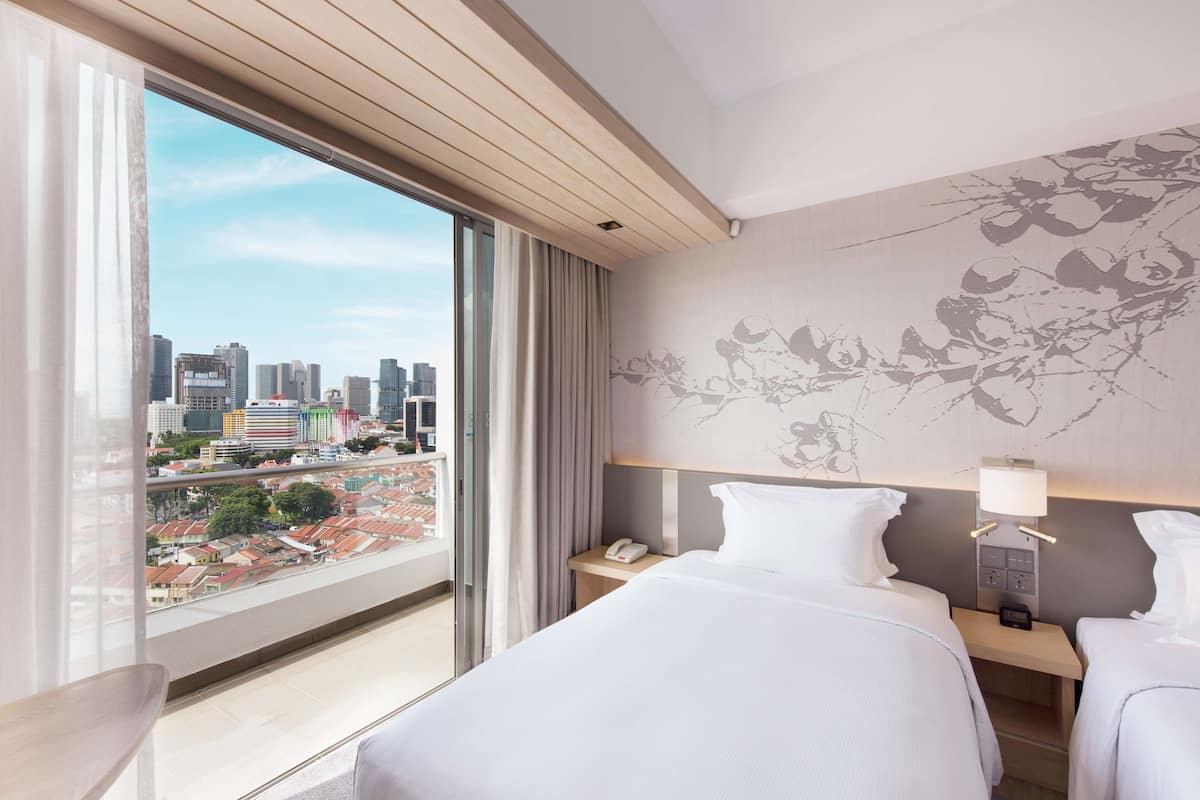 Deluxe-Zweibettzimmer, 2 Einzelbetten, Balkon | 1 Schlafzimmer, Zimmersafe, Schreibtisch, laptopgeeigneter Arbeitsplatz