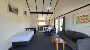 Mountain View Two-bedroom Apartment | Living area | Flat-screen TV