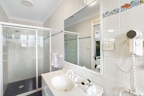 Shower, free toiletries, hair dryer, towels