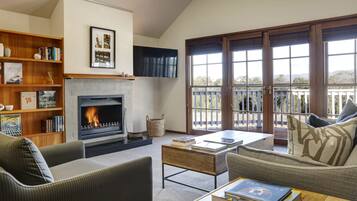 50-inch flat-screen TV with cable channels, TV, fireplace