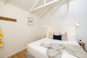 Ropa de cama de alta calidad y minibar 