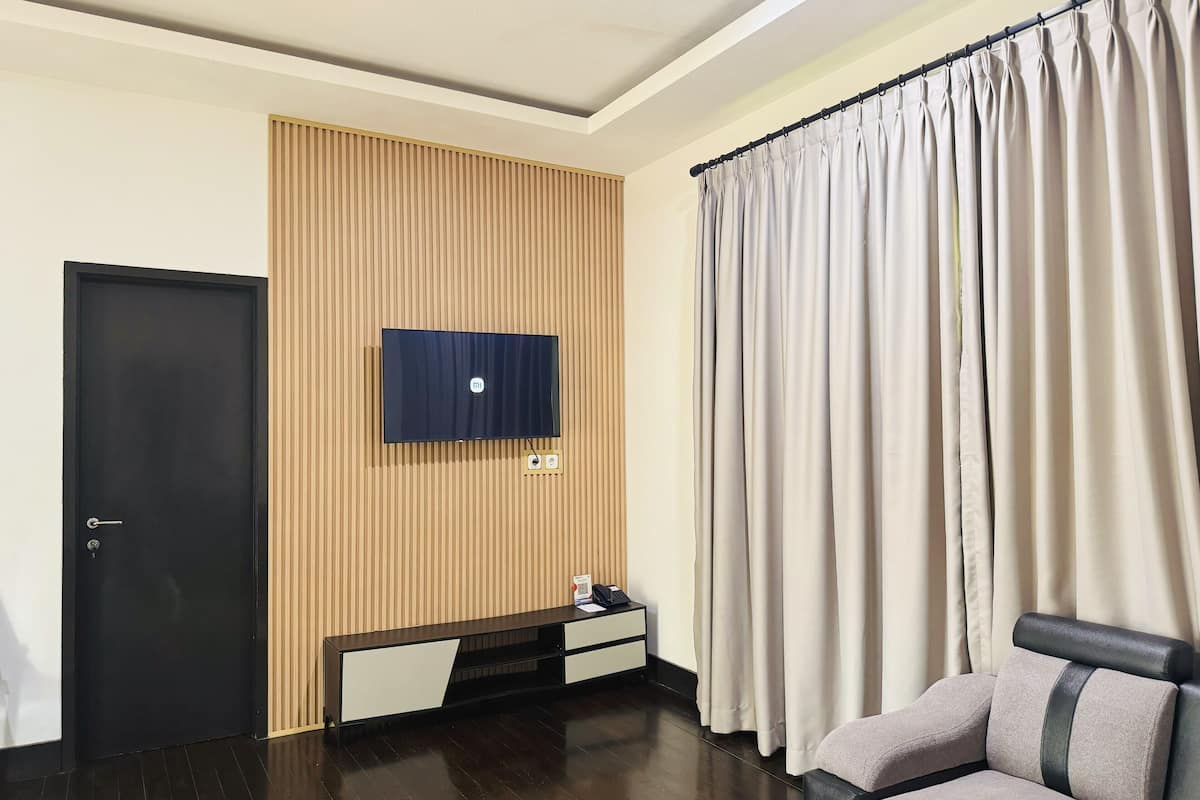 Nirwana Suite | Living area | 32-inch TV with cable channels