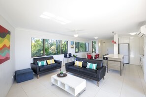 Three Bedroom Apartment with Water Views | Living area | 50-inch flat-screen TV with cable channels, TV - Noosa Shores Resort (Noosa Heads)